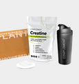 Packaging for Complement Creatine includes a resealable pouch labeled Creatine Pure Monohydrate next to a black shaker bottle branded Complement. Theres also a cardboard mailer and a plate with a scoop of creatine powder.