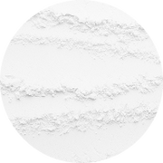 A circular image with a white, powdery texture and three horizontal, slightly raised ridges creating subtle lines across the surface.