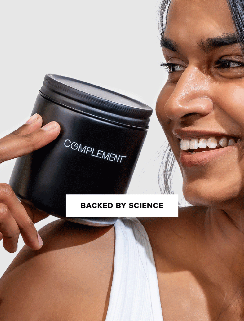 A smiling person holds a black container labeled COMPLEMENT near their face. A text box in the center reads BACKED BY SCIENCE. The background is plain white.