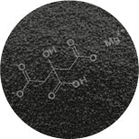 A granular black powder is shown with a chemical structure overlay. The image has a circular frame, and the chemical diagram indicates molecular bonds and compositions.