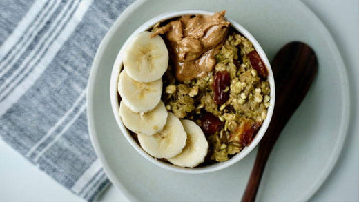 A bowl of overnight oats with banana and peanut butter