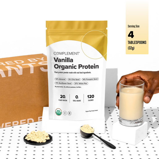 A pouch of Complement Vanilla Organic Protein sits beside a scoop and spoon of powder, a glass of protein shake, and a box. Nutrition facts and serving size details appear in the top right corner.