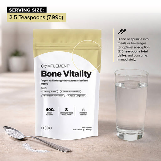 A bag of Complement Bone Vitality powder stands next to a glass of water and a spoon with powder. Text highlights the serving size as 2.5 teaspoons (7.99g) and instructions for mixing.
