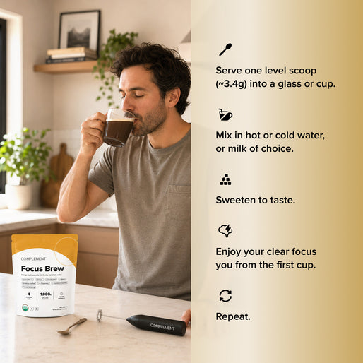 A man drinks from a glass mug in a kitchen near a bag labeled “Focus Brew.” Instructions beside him explain how to prepare the drink and note its focus benefits. A milk frother and spoon sit on the counter.