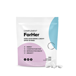 A white and pastel-colored pouch labeled Complement ForHer with text about benefits for women, including energy, cognitive function, reproductive health, and immunity, sits beside several white capsules.
