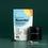A bag labeled Complement Essential and a black container with capsules are displayed on a green background. A small label in the corner reads BONUS Guide & Meal Planner.