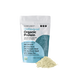 A white pouch of COMPLEMENT® Organic Vegan Plant-Based Protein - Unflavored by Complement stands upright, featuring a blend of almond, chia, pumpkin, sunflower seeds, and yellow pea; a small pile of protein powder sits in front.
