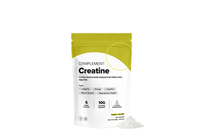 A yellow and white pouch labeled Complement Creatine stands upright, with some white powder spilled beside it. The packaging highlights benefits like muscle growth, energy, and cognition, and notes 5 grams per scoop and 100 servings.