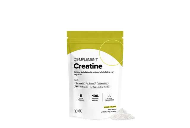 A yellow and white pouch labeled Complement Creatine stands upright, with some white powder spilled beside it. The packaging highlights benefits like muscle growth, energy, and cognition, and notes 5 grams per scoop and 100 servings.
