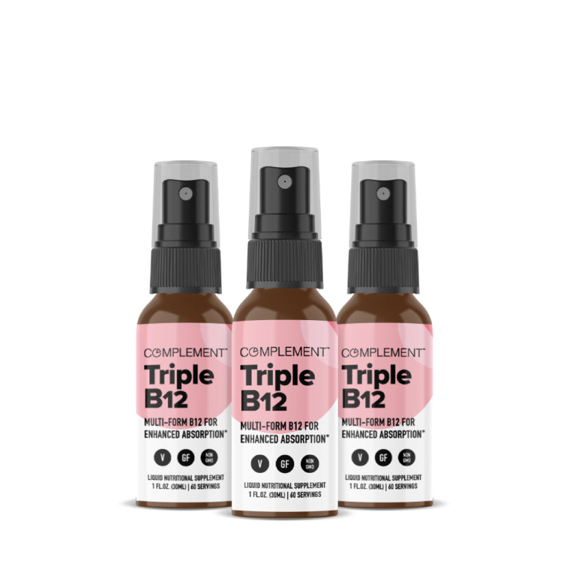 Three brown spray bottles of Complement 3x Vegan Liquid Triple B12 Complex with black caps are shown side by side on a white background. The labels highlight this B12 supplement’s vegan formula and enhanced absorption.
