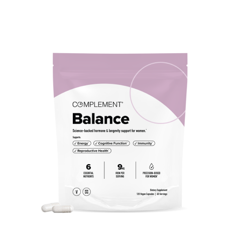 A white and purple pouch labeled Complement Balance, featuring supplements for womens health, with two capsules in front. The package highlights benefits like energy, cognitive function, immunity, and reproductive health.