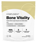 A beige and white package labeled Complement Bone Vitality features text highlighting benefits like strong bones and balanced mobility. The supplement provides 400 mg calcium, creatine, and 7 nutrients for bone and muscle support.