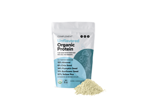 A package of O3MPLIMENT Unflavored Organic Protein powder next to a small pile of the powder. The bag lists ingredients: almond, chia seed, pumpkin seed, sunflower seed, and yellow pea. USDA Organic and meets European organic standards.
