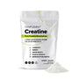 A white pouch labeled Complement Creatine with text highlighting its benefits for longevity, energy, brain health, muscle growth, and reproductive health. A small pile of white creatine powder is beside the pouch.