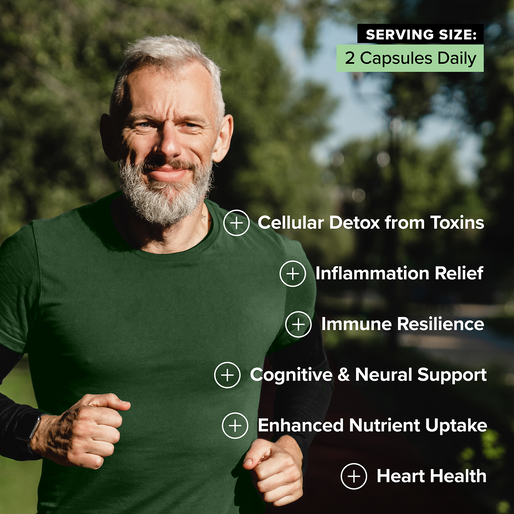 A smiling older man with a gray beard jogs outdoors in a green shirt. Wellness benefits such as detox, inflammation relief, immune support, and heart health are listed next to him, with “2 Capsules Daily” noted at the top.