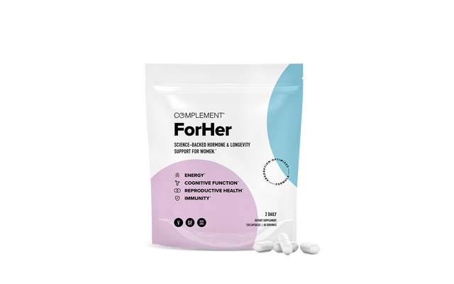 A white and pastel-colored resealable pouch labeled “Complement ForHer” sits upright, with four white capsules beside it. The packaging highlights support for energy, cognitive function, reproductive health, and immunity.