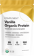 A white and gold pouch labeled “Complement Vanilla Organic Protein” highlights plant-based protein sources and nutritional info: 20g protein, 0g sugar, 120 calories. USDA organic and non-GMO icons are visible.