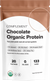A bag labeled Complement Chocolate Organic Protein with nutritional highlights: 20g plant protein, 0g total sugars, 133 calories, and ingredients like almond, chia, pumpkin, sunflower, and yellow pea.