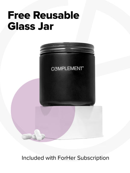 A black Complement jar labeled ForHer Multinutrient rests on a white block with a pale, geometric backdrop. The scene, highlighting womens health, includes three white capsules and a purple element. Text reads: Free Reusable Glass Jar.