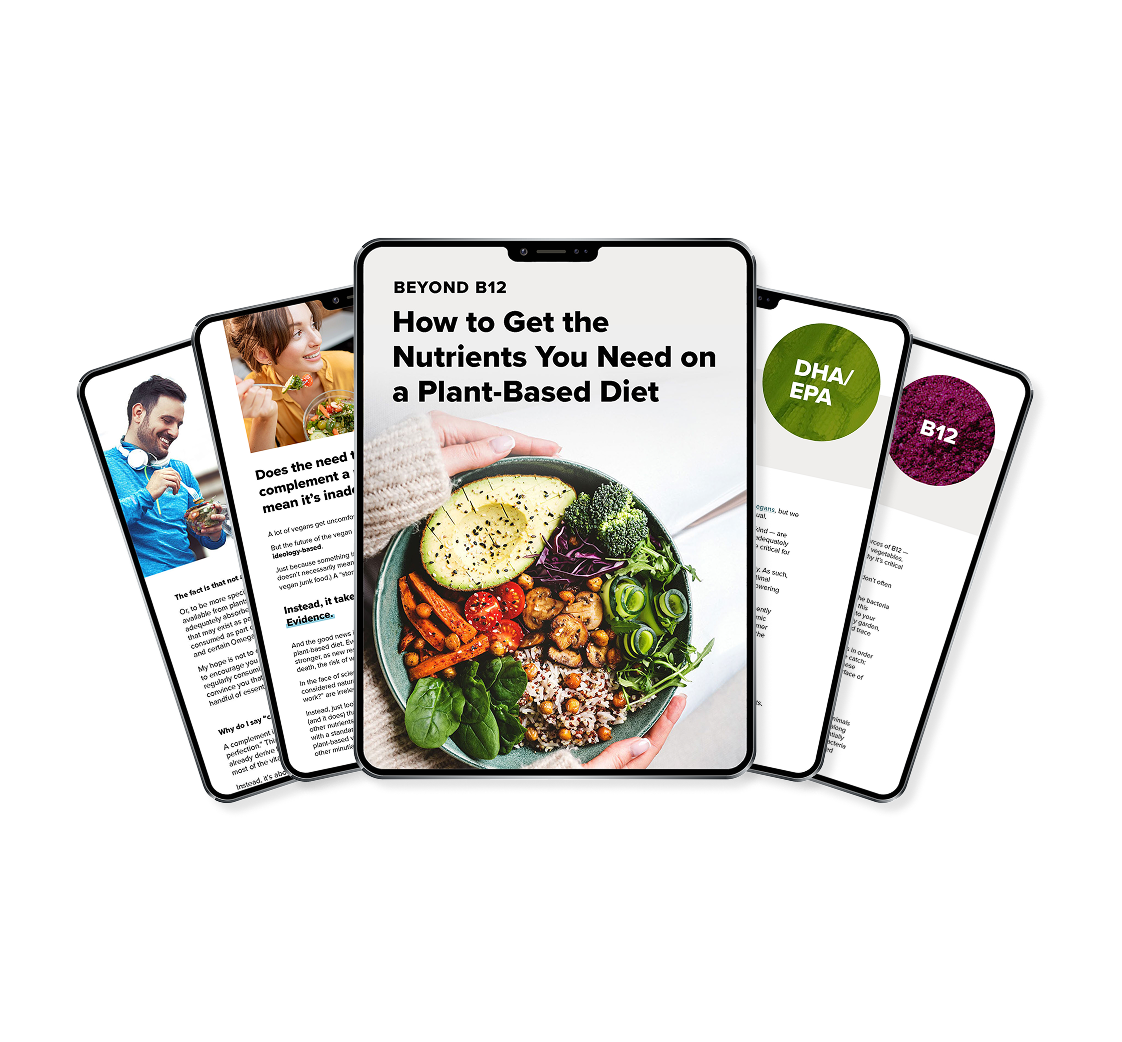 Five digital tablets are displayed in a fan arrangement. The center tablet shows a colorful plant-based meal and the title “How to Get the Nutrients You Need on a Plant-Based Diet.” Other tablets show related text and images.