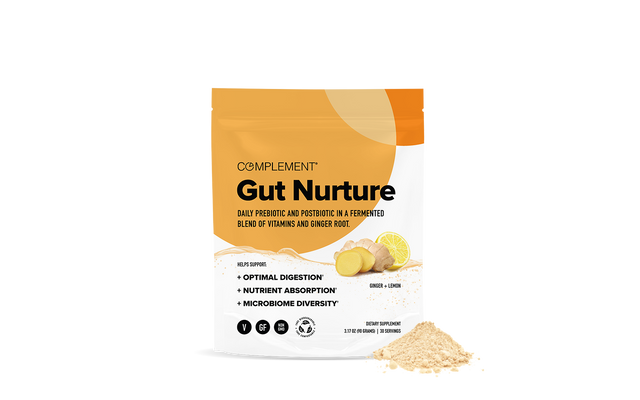 A pouch labeled Complement Gut Nurture with ginger, lemon, and powder beside it. Text highlights daily prebiotic and postbiotic benefits for digestion, nutrient absorption, and microbiome diversity.