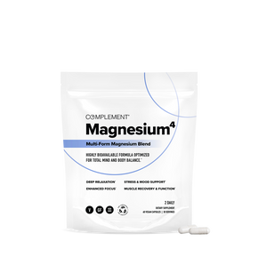 A white pouch labeled COMPLEMENT® Magnesium by Complement emphasizes relaxation, mind and body balance, mood support, and focus. Two white capsules are displayed in front of this magnesium supplement.