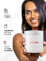 A person smiling and holding a container labeled plantyou. Text on the image highlights features: essence of berry, reusable jar with first order, and smooth and easy to swallow.