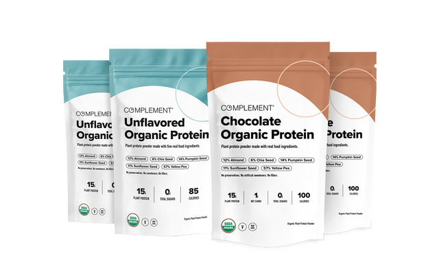 Four pouches of Complement Organic Protein powder in unflavored and chocolate varieties.