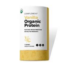 A cylindrical container of Complement Vanilla Organic Protein powder, featuring plant-based, real food ingredients. The label indicates it contains 30 servings and includes icons for being vegan, gluten-free, and soy-free.