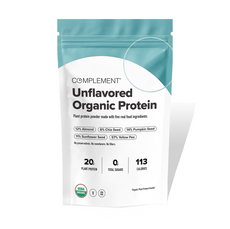A white and teal bag of Complement Unflavored Organic Protein powder, highlighting 20g plant protein, zero sugars, 113 calories, and ingredients like almond, chia, pumpkin, sunflower, and pea seeds.