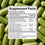Supplement facts label on a background of green capsules
