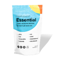 A white and blue pouch of Complement Essential multinutrient powder, featuring a sun graphic. The label highlights key nutrients: B12, D3, DHA/EPA, iodine, K2, zinc, magnesium, and selenium, for a plant-based diet.
