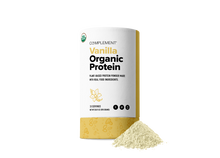 Packaging of Complement Vanilla Organic Protein powder with plant-based protein. The container is white with yellow accents and a small pile of protein powder is shown outside the packaging.