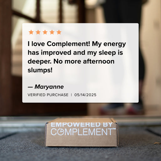 A box labeled “EMPOWERED BY COMPLEMENT® Energy Stack” sits on a doormat. Overlaid is Maryanne’s 5-star review praising better energy and sleep, marked as a verified purchase, dated 05/14/2025. Brand: Complement.
