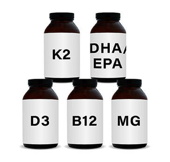 Five brown supplement bottles with white labels arranged in a pyramid. Labels read: K2, DHA/EPA, D3, B12, and MG, displayed in a well-lit setting.