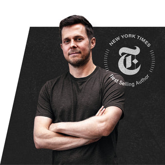 A person with short dark hair and a beard stands with arms crossed, wearing a dark t-shirt. In the background, a New York Times Best Selling Author emblem is visible.