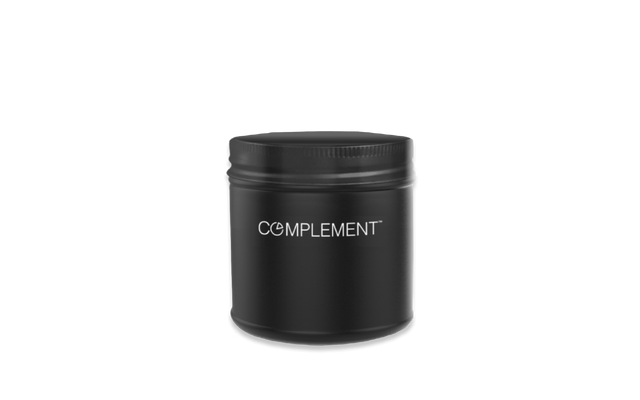A black cylindrical container with a screw-on lid, featuring the word COMPLEMENT printed in white on the front, set against a plain white background.