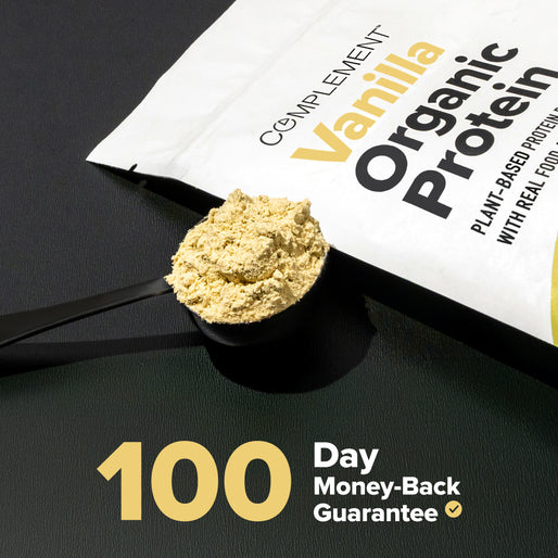 A scoop of vanilla organic protein powder rests on a black surface next to its packaging, which reads Complement Vanilla Organic Protein. Text below says 100 Day Money-Back Guarantee with a checkmark.