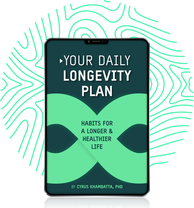 A tablet displays the cover of a book titled Your Daily Longevity Plan: Habits for a Longer & Healthier Life by Cyrus Khambatta, PhD, against a background with green abstract lines.